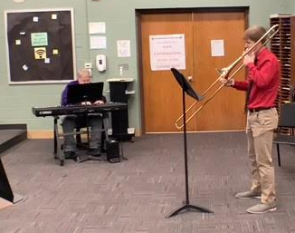 Male student playing the Trombone